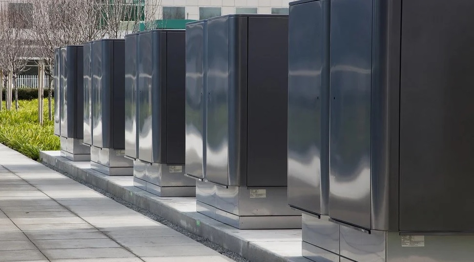 Row of outdoor power enclosures at a data center site